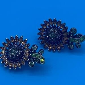 Heidi Daus Swarovski crystal sunflower clip earrings.